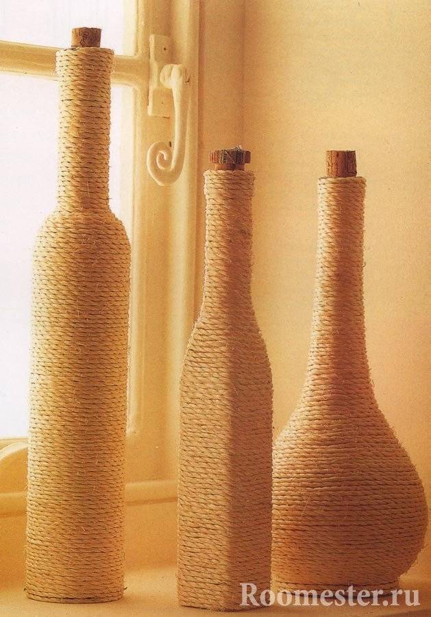 Оформление декора ветками в напольных вазах